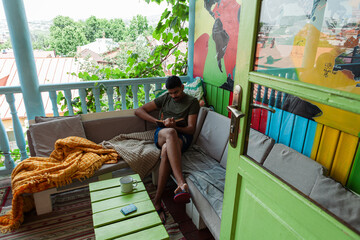 Colourful art hostel in old town with budget-friendly dorms, painted walls, shared kitchen, urban...