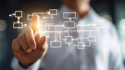 Person interacts with digital flowchart in a modern office setting to visualize processes and ideas