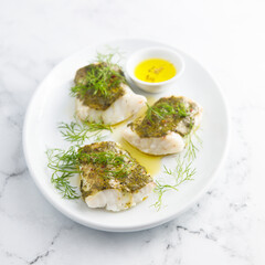 White fish fillet with herbs