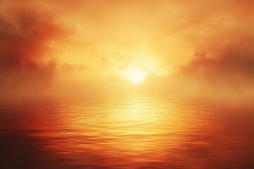 Obraz premium Vibrant sunset over a calm sea creating a warm glow with reflections on the water, enveloped by soft clouds in the evening sky