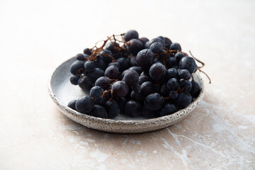 Dark grape on a plate