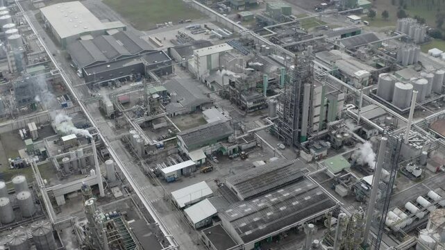 Aerial of DRT green chemistry facility structures, France. Drone top-down view