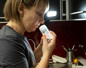 Exploring the aromatic world of spices in a modern kitchen while crafting a delightful culinary masterpiece at twilight