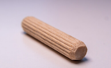 Close up of wooden dowel used in flat pack furniture assembly
