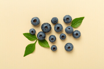 Fresh bright blueberries on color background,top view