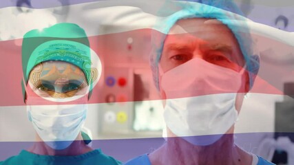 two surgeons standing in operating room wearing surgical caps, with animated health data overlay - Powered by Adobe
