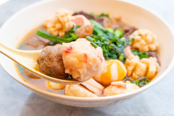 angle view bowl of ChaoZhou beef offal and various seafood ingredients at horizontal composition