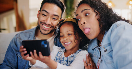 Parents, happy and laugh with selfie on sofa, playful and bonding with post on web in family home. People, mother and father with child, photography and comic joke with love in living room at house