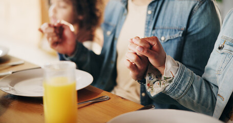 Dinner, closeup and family holding hands with prayer in home for grace, appreciation and thankful for food. Christian people, table and grateful for lunch with gratitude, religion and praise together