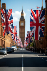 Fototapeta premium British street scene with flags and iconic clock tower. Celebratory atmosphere, travel destination, and patriotic display.