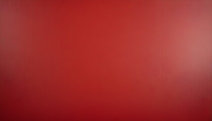 A bold and seamless red background showcases a soft gradient and fine textures, perfect for designs.