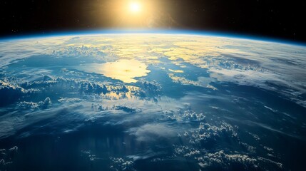 Fototapeta premium Sunrise over earth aerial view of the planet's atmosphere space nature celestial beauty