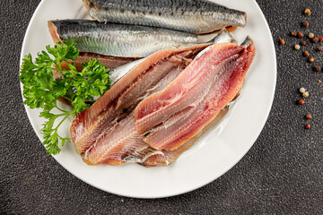 Sardine raw fish fillet seafood anchovy filet fresh delicious gourmet food background on the table rustic food top view copy space pescetarian diet