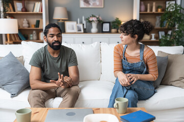 Young couple, a man and a woman, discuss difficult philosophical, sociological and psychological...