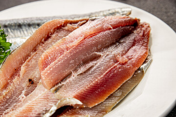 Sardine raw fish fillet seafood anchovy filet fresh delicious gourmet food background on the table rustic food top view copy space pescetarian diet