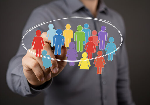 A hand interacts with a digital network of diverse colorful human icons symbolizing global community, teamwork, social media, and online collaboration.