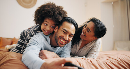 Bedroom, family and bonding with child, smartphone and watching movies on website, entertainment...