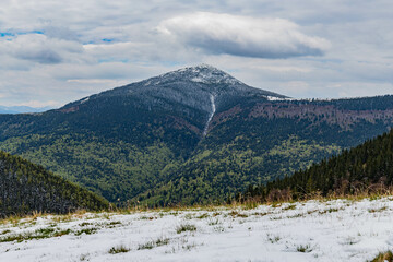 view of the top of Mount Khomyak from the neighboring ridge