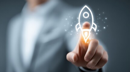 Business professional activating rocket symbol for innovation and growth in digital startup environment