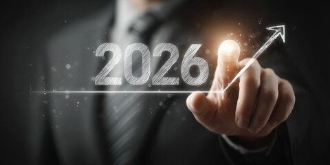 Business professional pointing at a futuristic projection for 2026 growth strategy