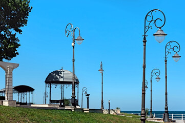Street lamps on the coast of the Black sea in Constanta, Romania