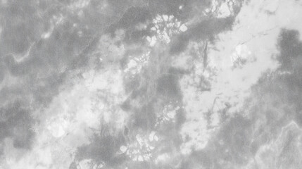 Abstract gray marble texture with subtle white veining and organic patterns, creating a sophisticated and elegant background suitable for various design applications