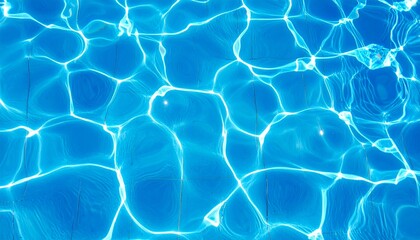 Blue water with ripples on the surface. Defocus blurred transparent blue colored clear calm water surface texture with splashes and bubbles.	
