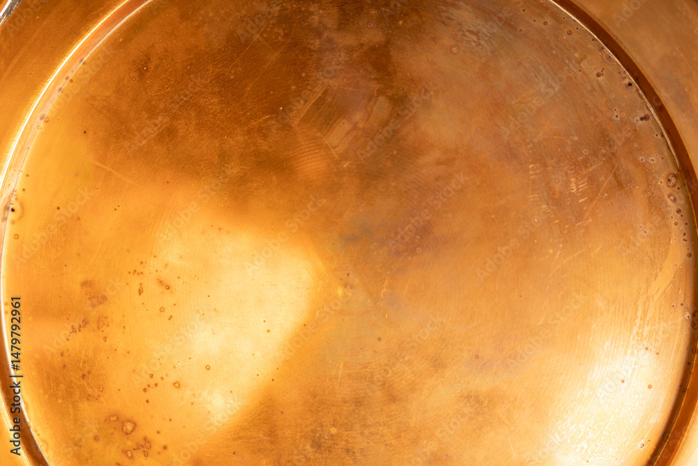 Poster high-resolution image of a golden brass texture. perfect for backgrounds, design projects, and metal