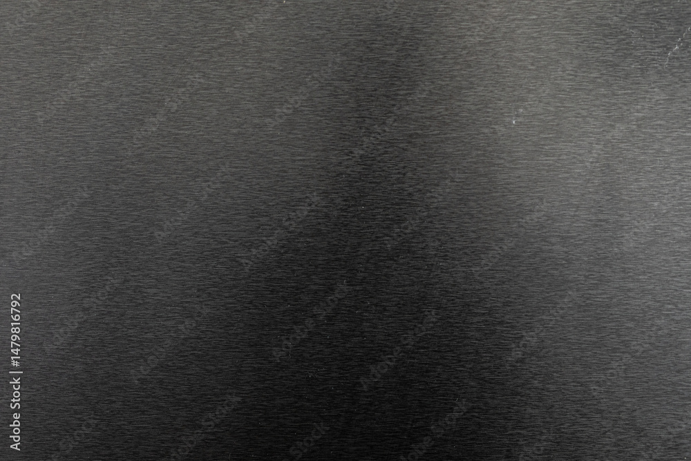 Poster high-resolution image of a dark brushed metal texture, perfect for backgrounds and design projects.
