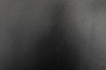 High-resolution image of a dark brushed metal texture, perfect for backgrounds and design projects.