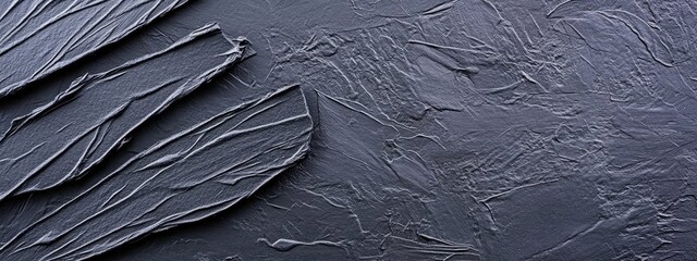 Textured dark gray surface with layered,  impasto marks