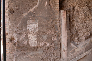 High-resolution image of weathered Roman wall ruins, showing texture and detail. Perfect for historical, archaeological, or architectural projects.