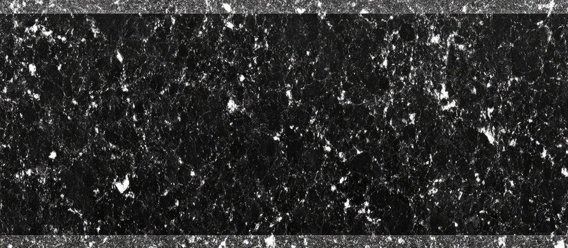 Abstract black and white textured surface. Intricate pattern of speckles and variations in tone