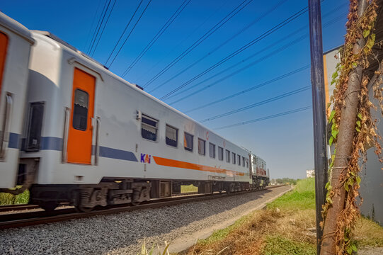 a series of economy class trains that speed in Indonesia during the day, Indonesia, 28 October 2023.