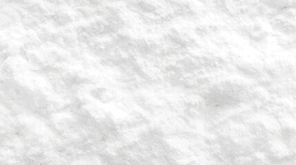 Fototapeta premium Fine white powder texture, resembling flour, sugar, or snow, spread evenly across the surface.