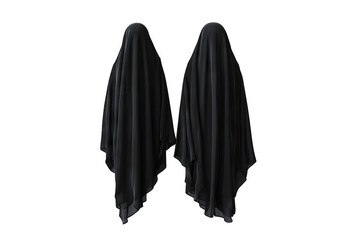 Naklejka premium Two Figures Are Completely Covered In Black Fabric Standing Side-by-side Against A White Wall The Fabric Is Smooth And Drapes Down Creating A Sense Of Mystery And Anonymity