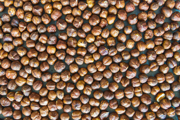 Multitude of hazelnuts, view from above, useful ingredient for cream and healthy diet.