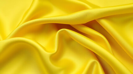 Smooth Flowing Yellow Silk Fabric &ndash; Elegant Satin Textile with Luxurious Folds and Soft Light Reflections for Backgrounds, Fashion, or Design