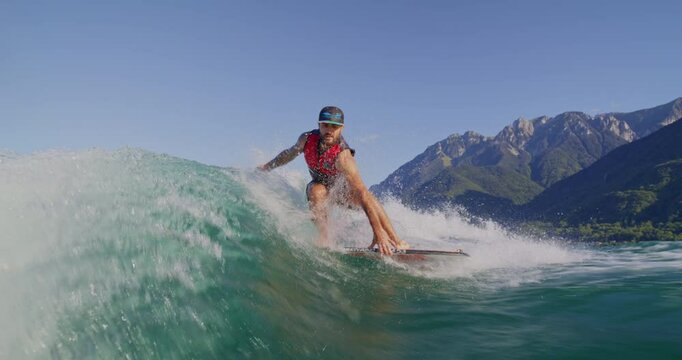 Sunset watersports on Lake L&eacute;man with friends: wakesurfing, foiling, and alpine views. Vibrant action meets Swiss serenity&mdash;perfect for outdoor, lifestyle, or travel projects.