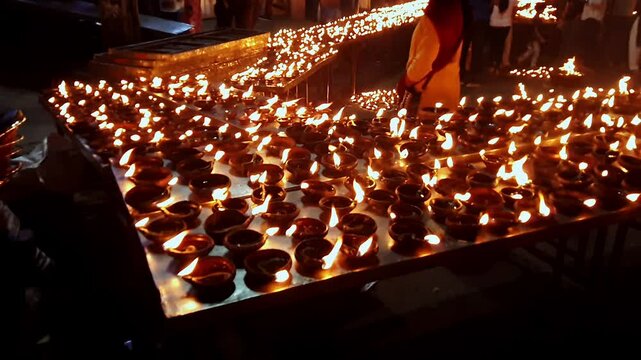 Video of thousands of clay diyas being lit by women during Hindu festival celebration in Bengaluru