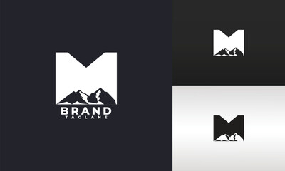 letter m and mountain logo
