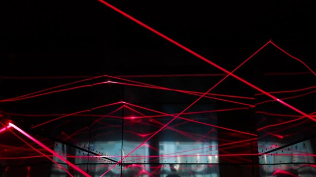 Room with laser security grid activated, representing motion-detection systems in vaults or banks.