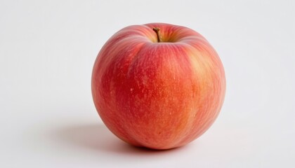 a juicy peach, white background, fuzzy skin, pink blush, 4k resolution