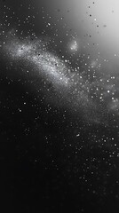Obraz premium Stardust symphony: An ethereal expanse of celestial particles in grayscale elegance