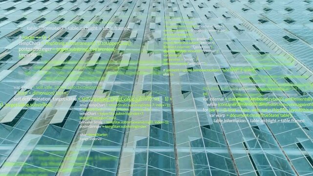 Skyscraper facade being overlaid with green code snippets on angled glass panels and metal frames