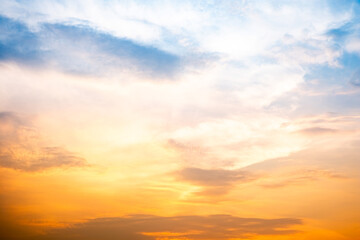 Beautiful , luxury soft gradient orange gold clouds and sunlight on the blue sky perfect for the background, take in evening,Twilight, Large size, high definition landscape photo