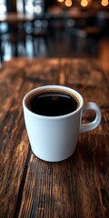 Aromatic Black Coffee in White Cup on Rustic Wooden Table