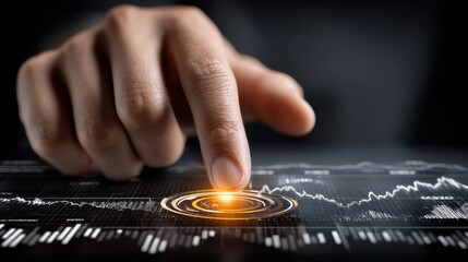 A hand is pointing to a glowing dot on a screen