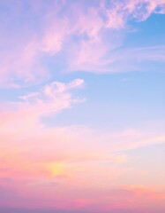 Fototapeta premium A breathtaking pink and blue sky at sunset, with soft pastel hues blending seamlessly, creating a serene and dreamy atmosphere above the horizon.