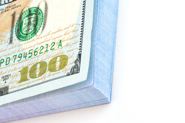 stack of American hundred dollar bills. Macro shot on a white background